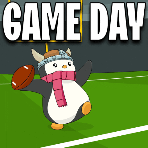 Cartoon gif. Cute little penguin tosses a football to the right and to the left on a football field, changing back and forth between two completely different outfits. The first is a hoodie with a jester hat; the second is a red scarf with a viking helmet. Text, "Game day."